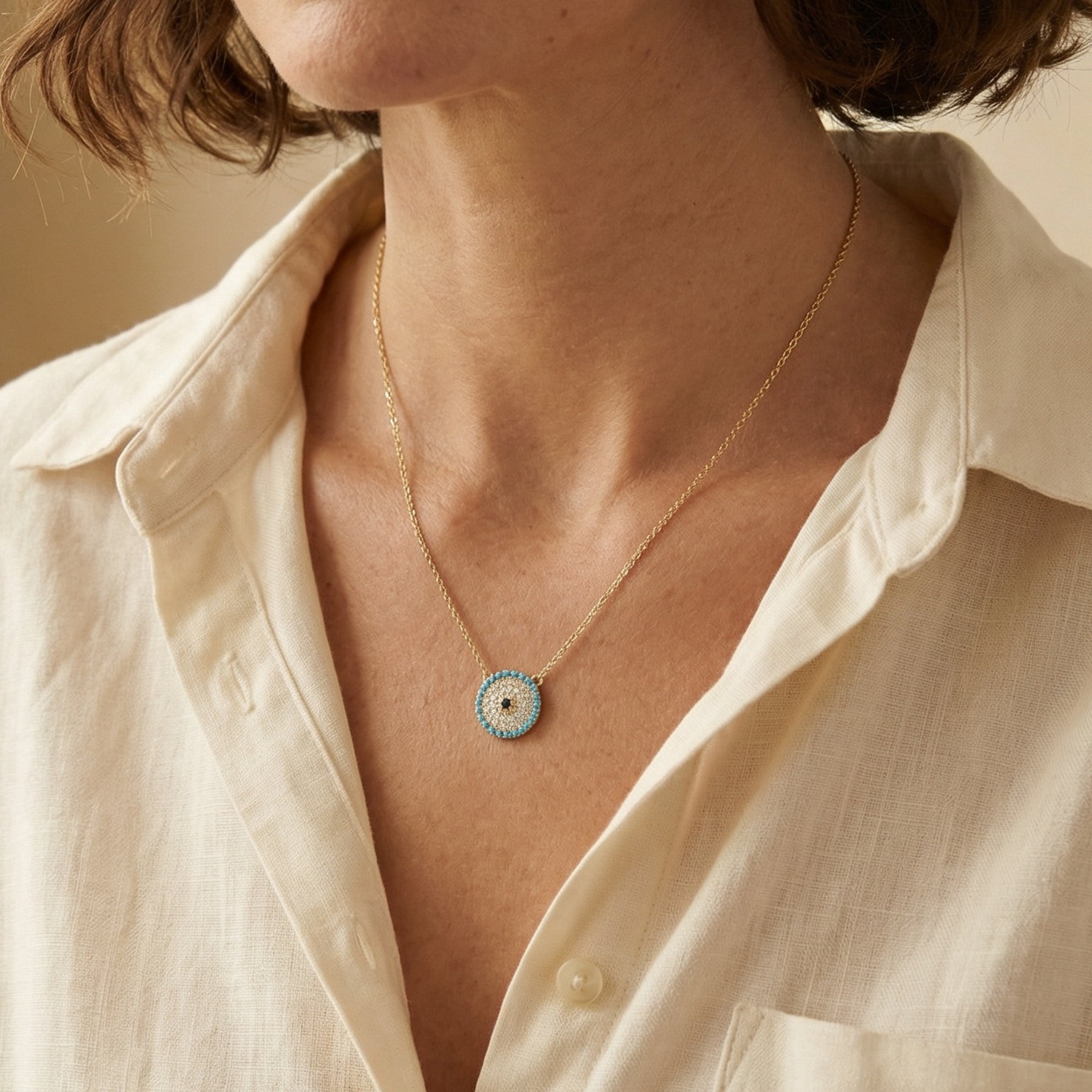 Elegant Turquoise and Crystal Evil Eye Necklace