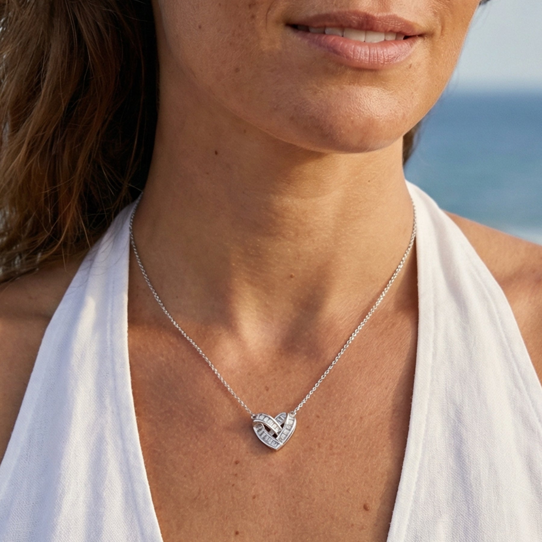 Elegant Silver Heart Pendant Necklace with Baguette Crystals