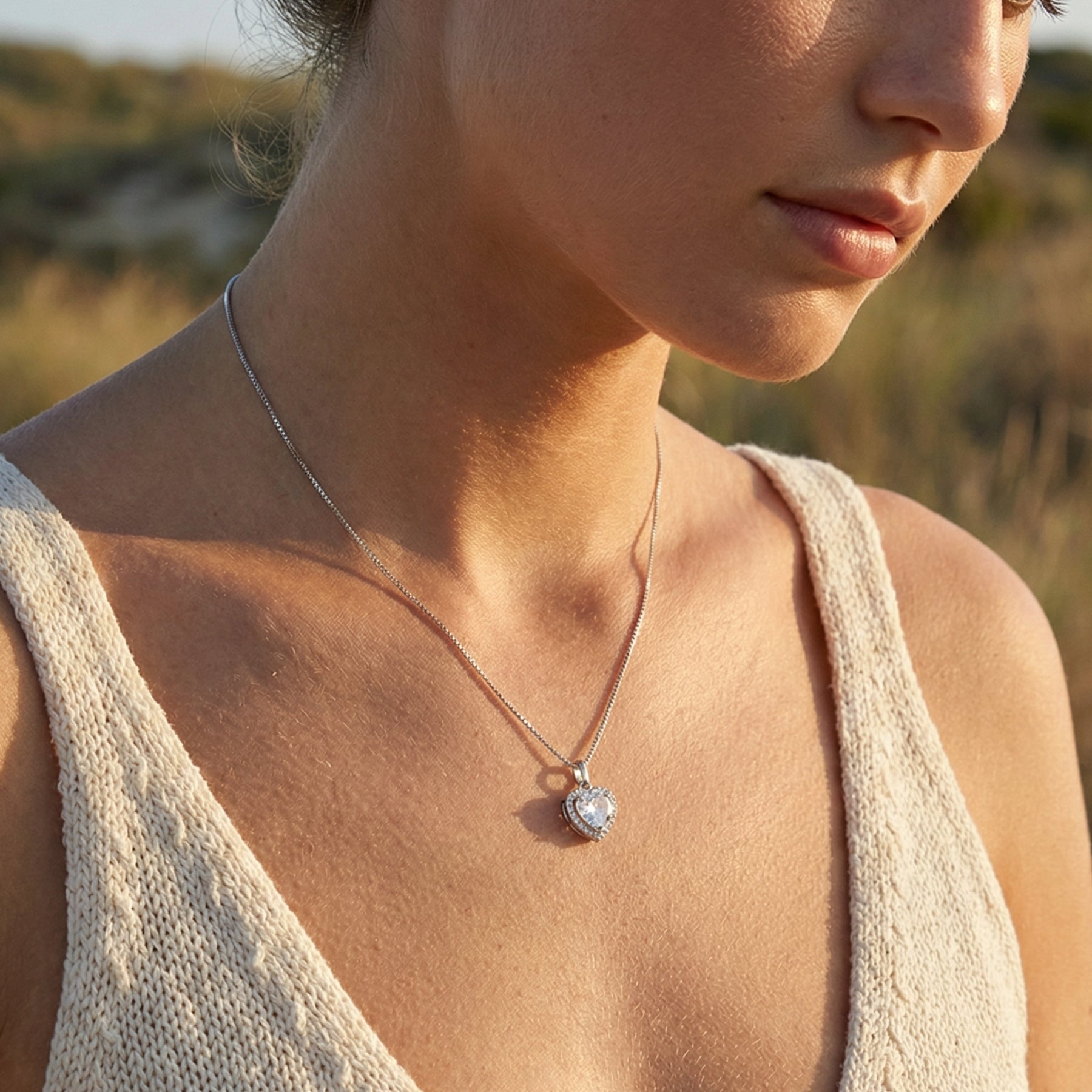 Heart-Shaped Crystal Pendant Necklace in Gold and Silver