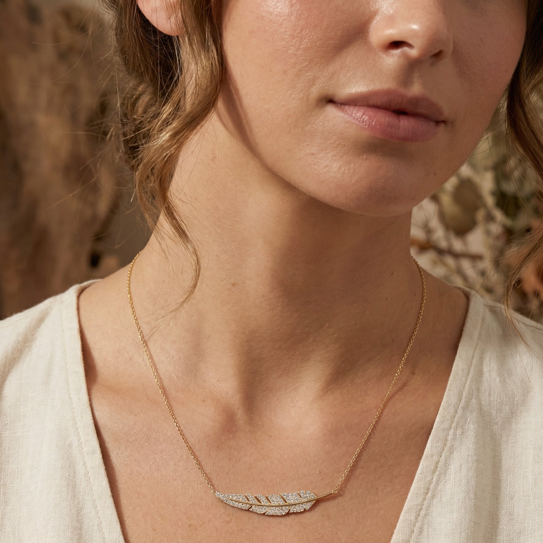 Elegant Feather Pendant Necklace with Crystals