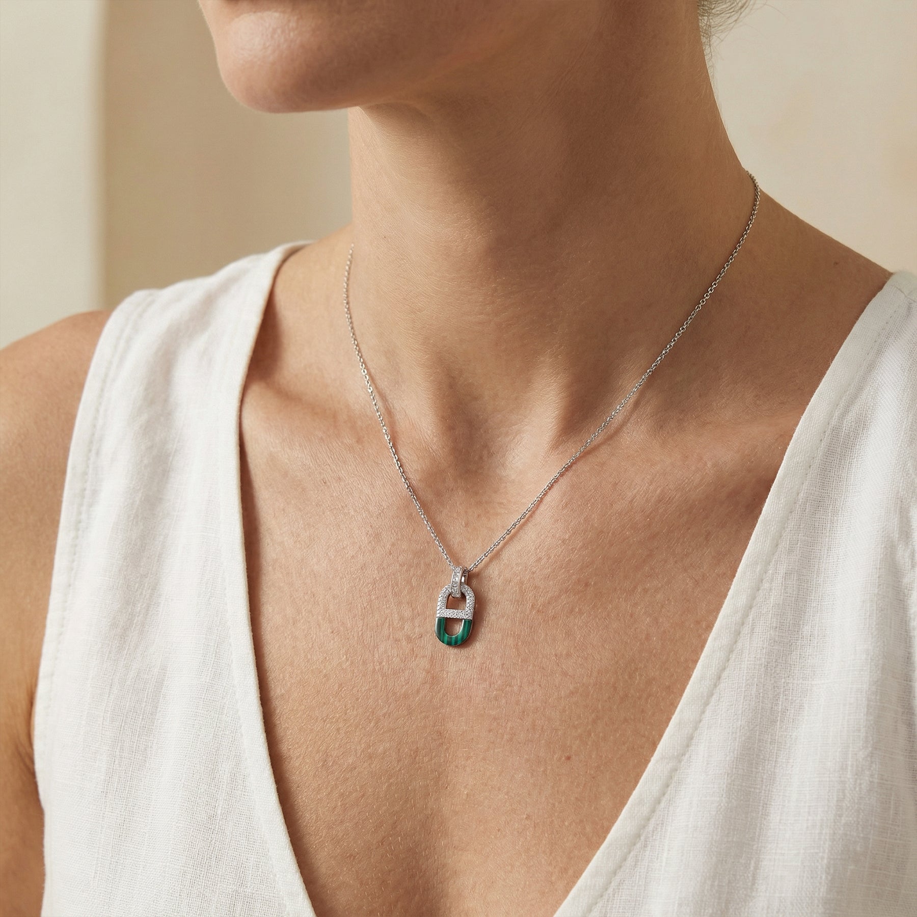 Elegant Silver Necklace with Green Gem Pendant