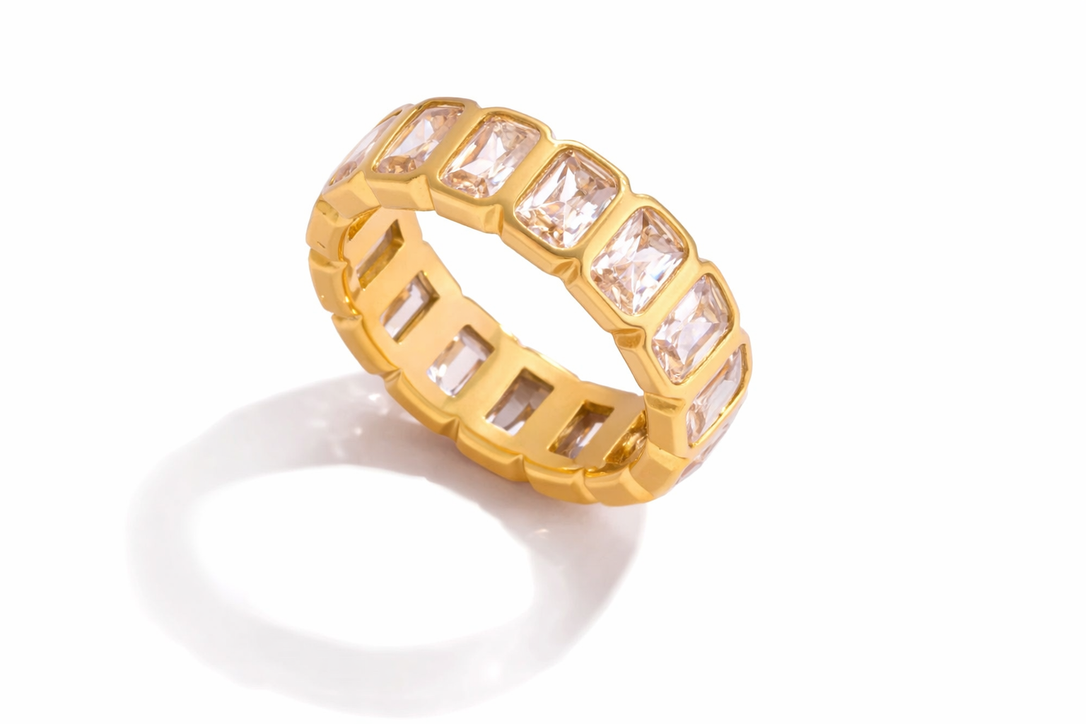 Elegant Gold Band Ring with Rectangular Gemstones