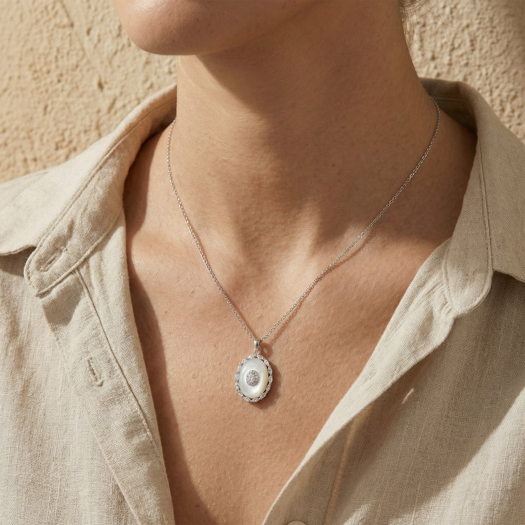 Elegant Oval Pearl Pendant Necklace with Crystal Accents